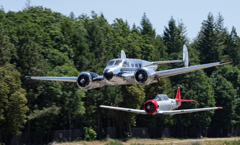 Beech-D18s-Takeoff-wtih-North-American-AT6-NCA-Web